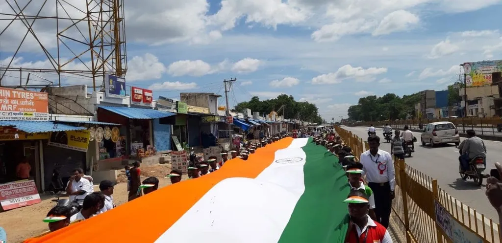 Students march with 150 feet long National Flag
